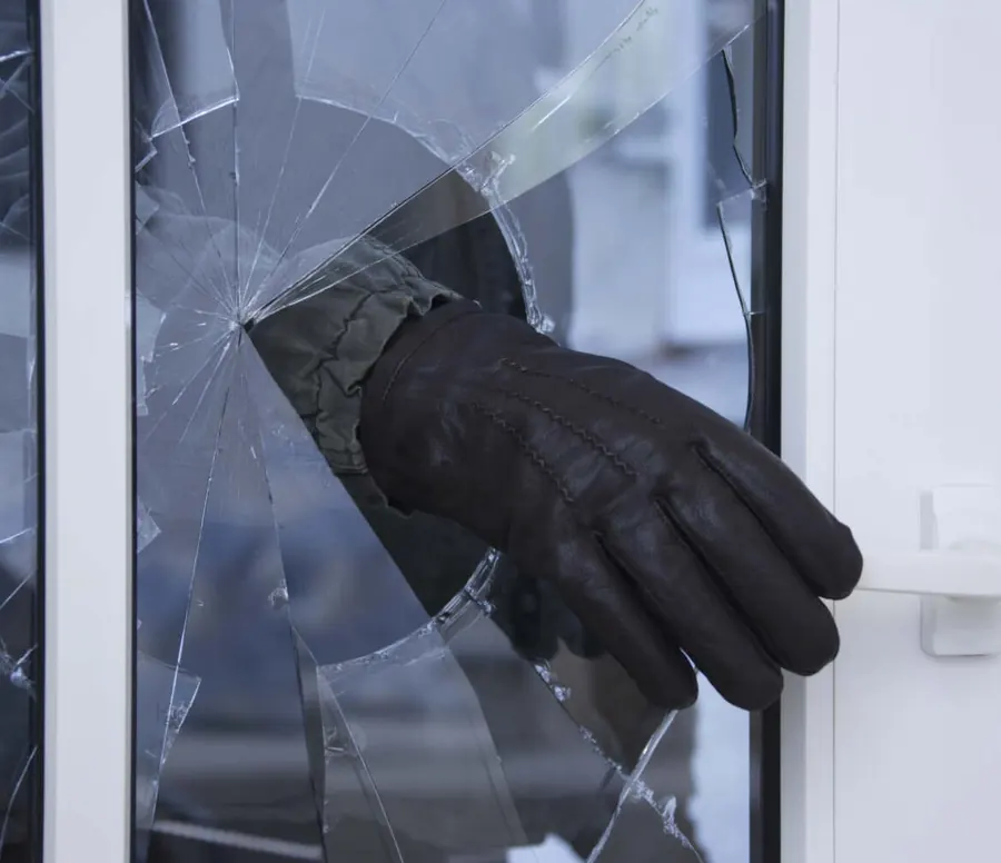 Broken door glass and emergency boarding up